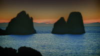 An evening shot of the Faraglioni, Capri